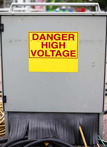 danger high voltage sign on enclosure