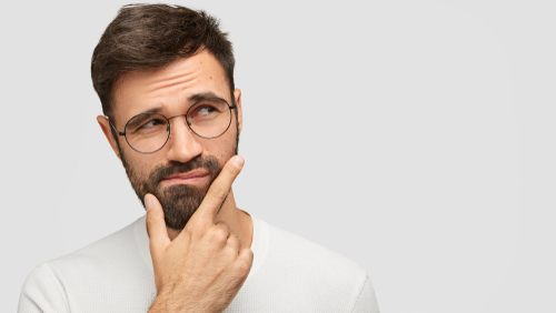 man pondering decision